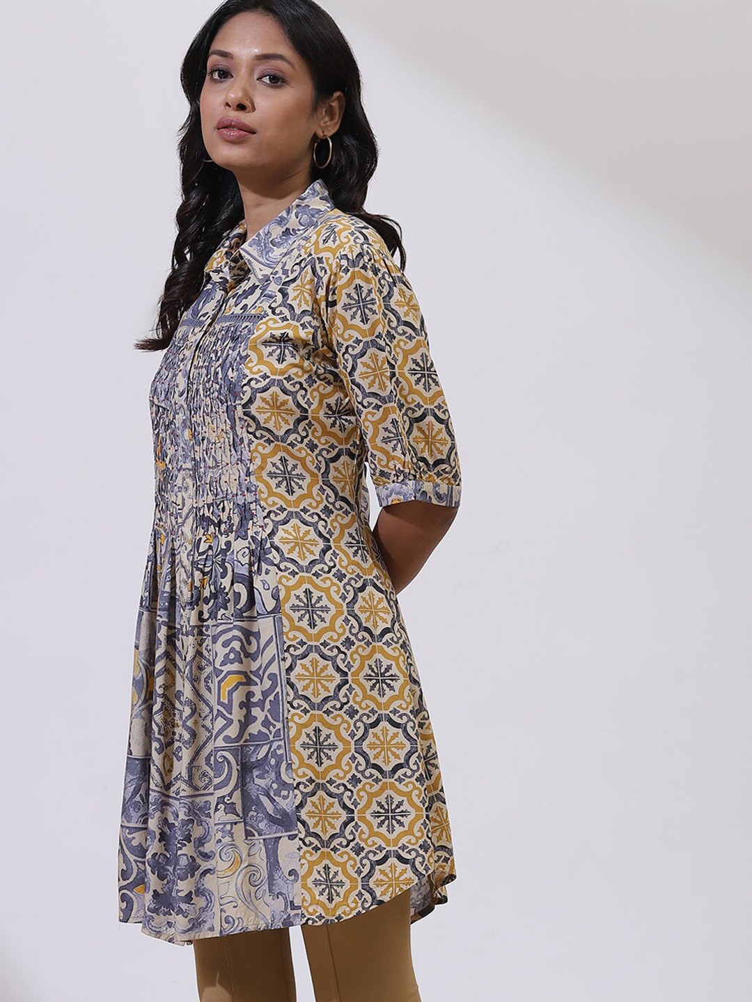 

Lakshita Women Grey & Mustard Shirt Collar Printed Tunic with Smocking Detail