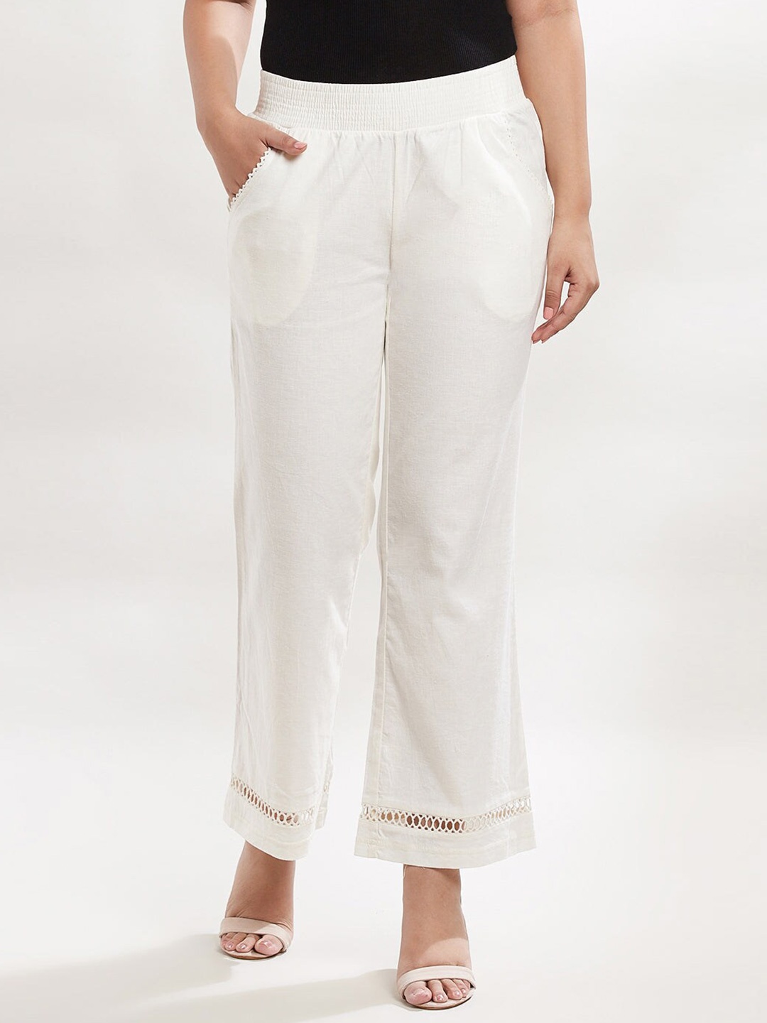 

Lakshita Women White Cotton Solid Hem Design Palazzos