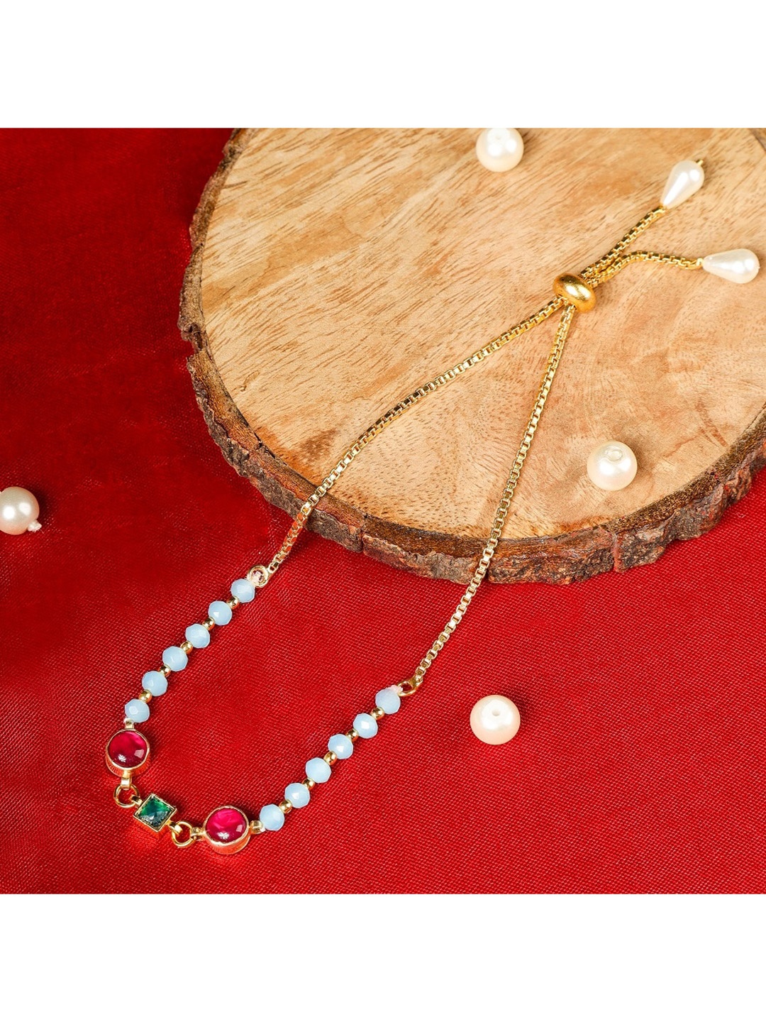 

AURAA TRENDA White & Gold-Toned & Plated Beaded Rakhi