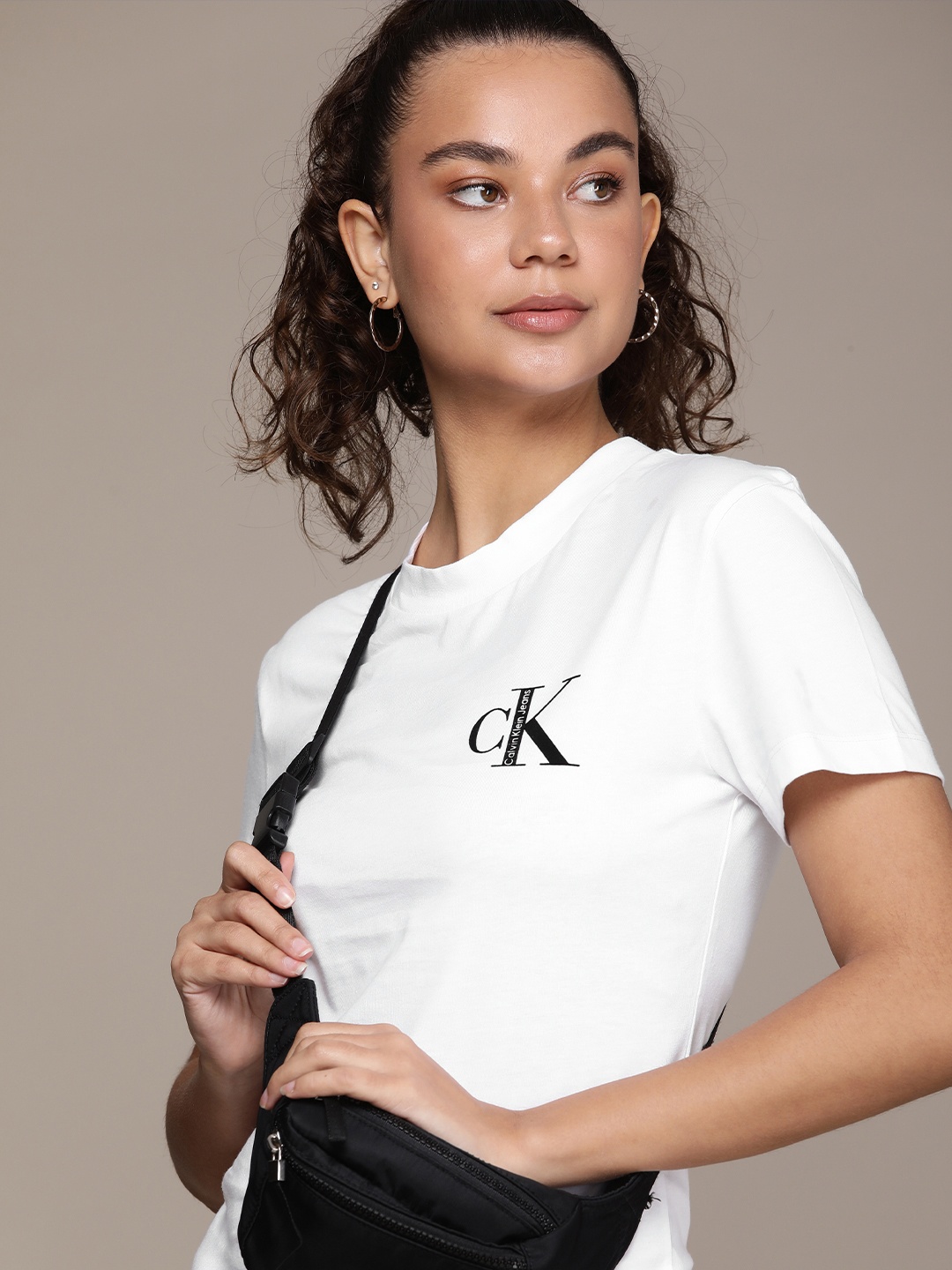 

Calvin Klein Jeans Women White & Black Brand Logo Printed T-shirt
