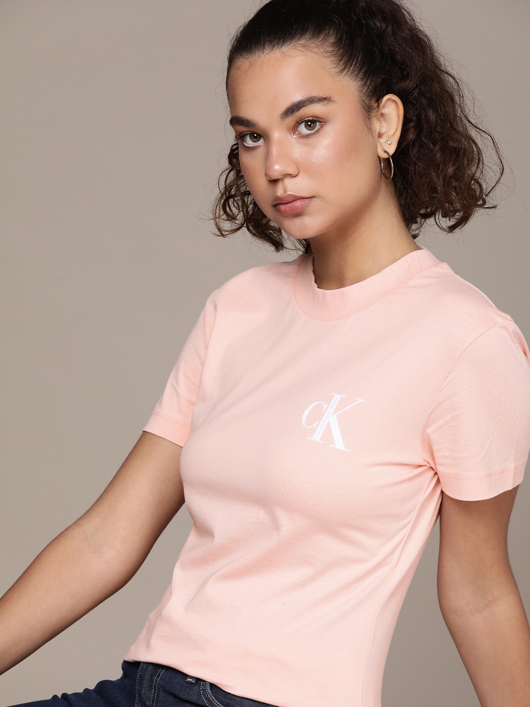 

Calvin Klein Jeans Women Pink & White Brand Logo Printed T-shirt