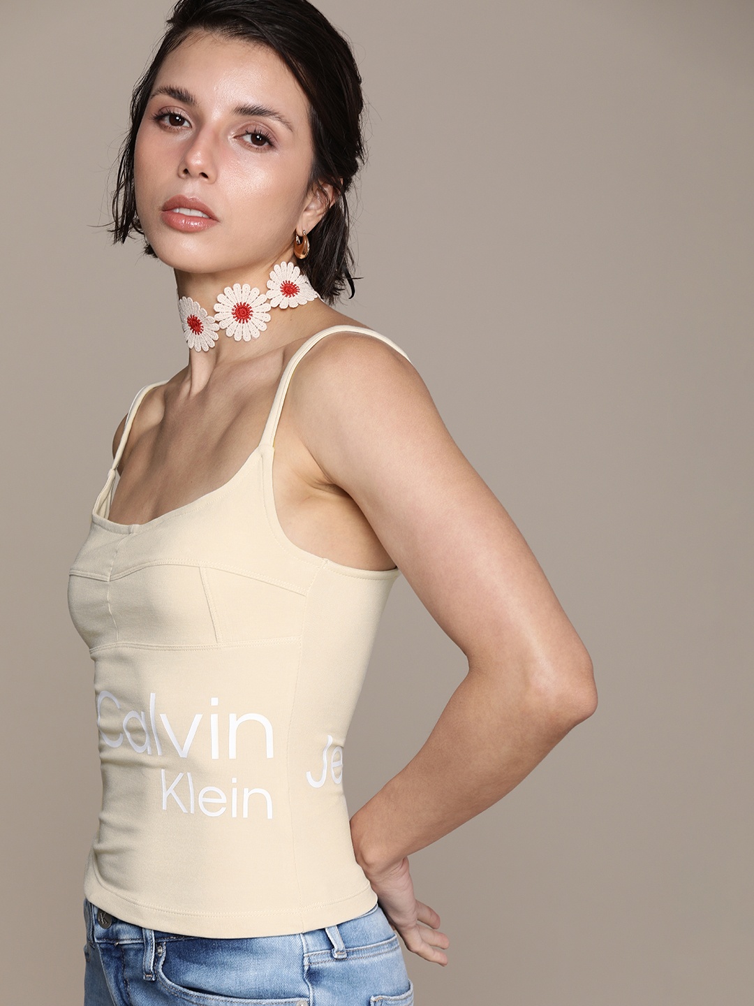 

Calvin Klein Jeans Women Beige Typography Printed Shoulder Strap Slim Fit Casual T-shirt