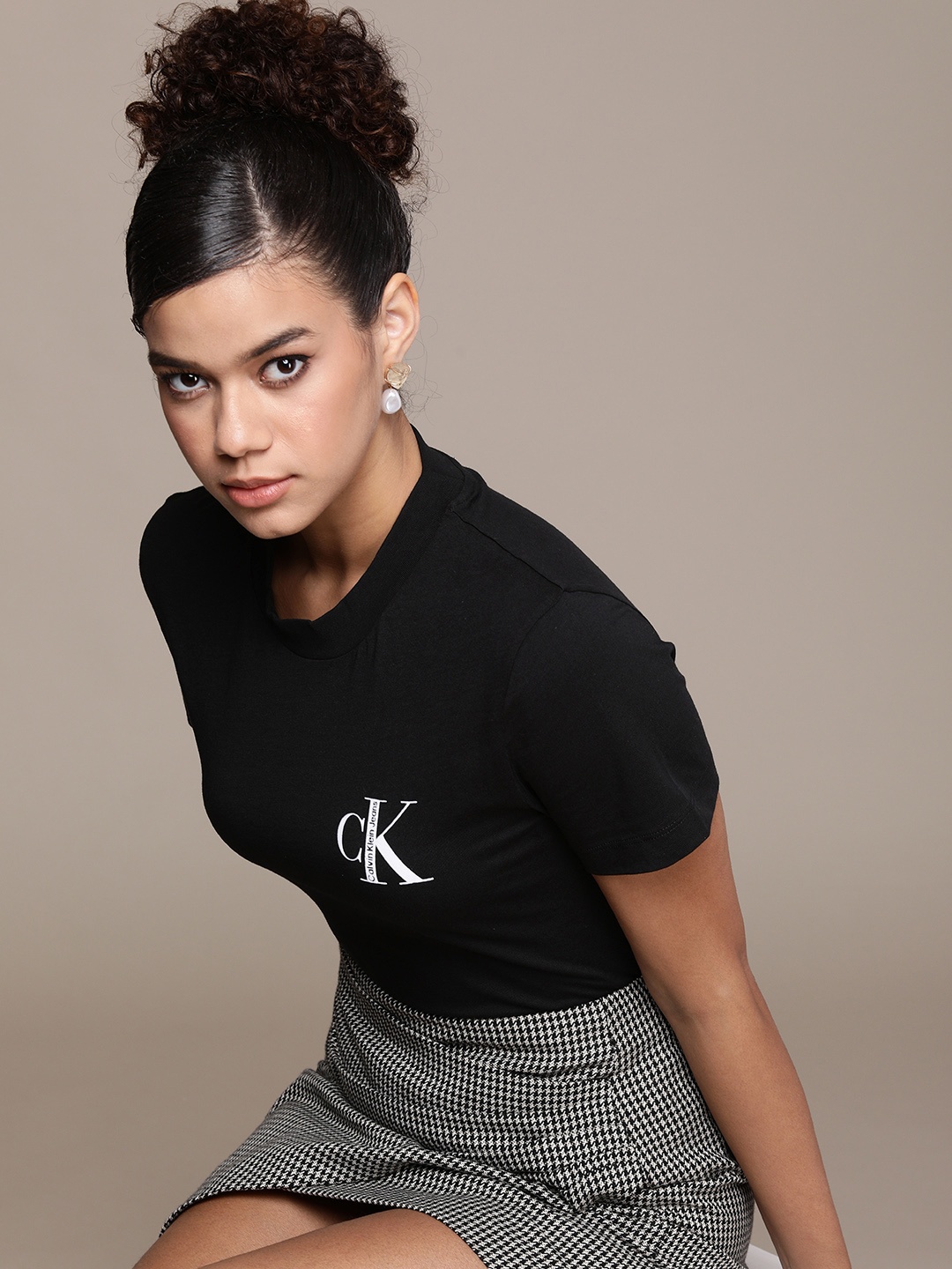 

Calvin Klein Jeans Women Black Brand Logo Placement Self Design Slim Fit T-shirt