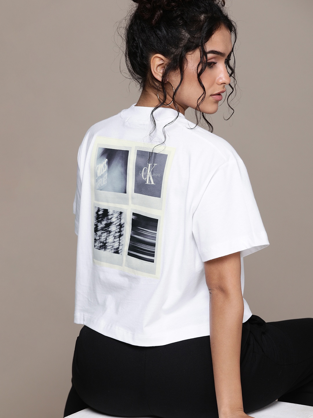 

Calvin Klein Jeans Women White Printed Drop-Shoulder Sleeves Pure Cotton T-shirt
