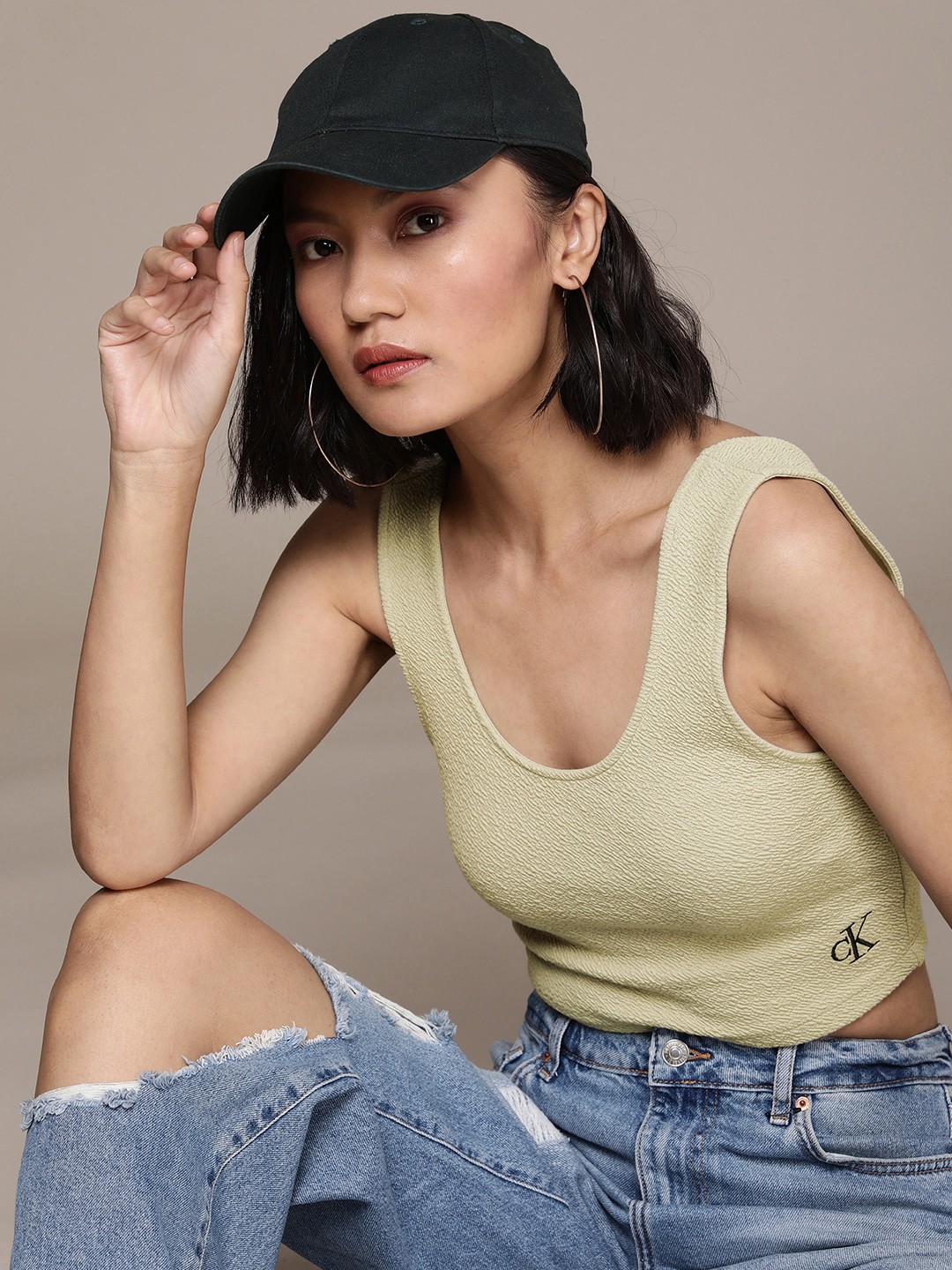 

Calvin Klein Jeans Women Green Textiured Slim Fit T-shirt