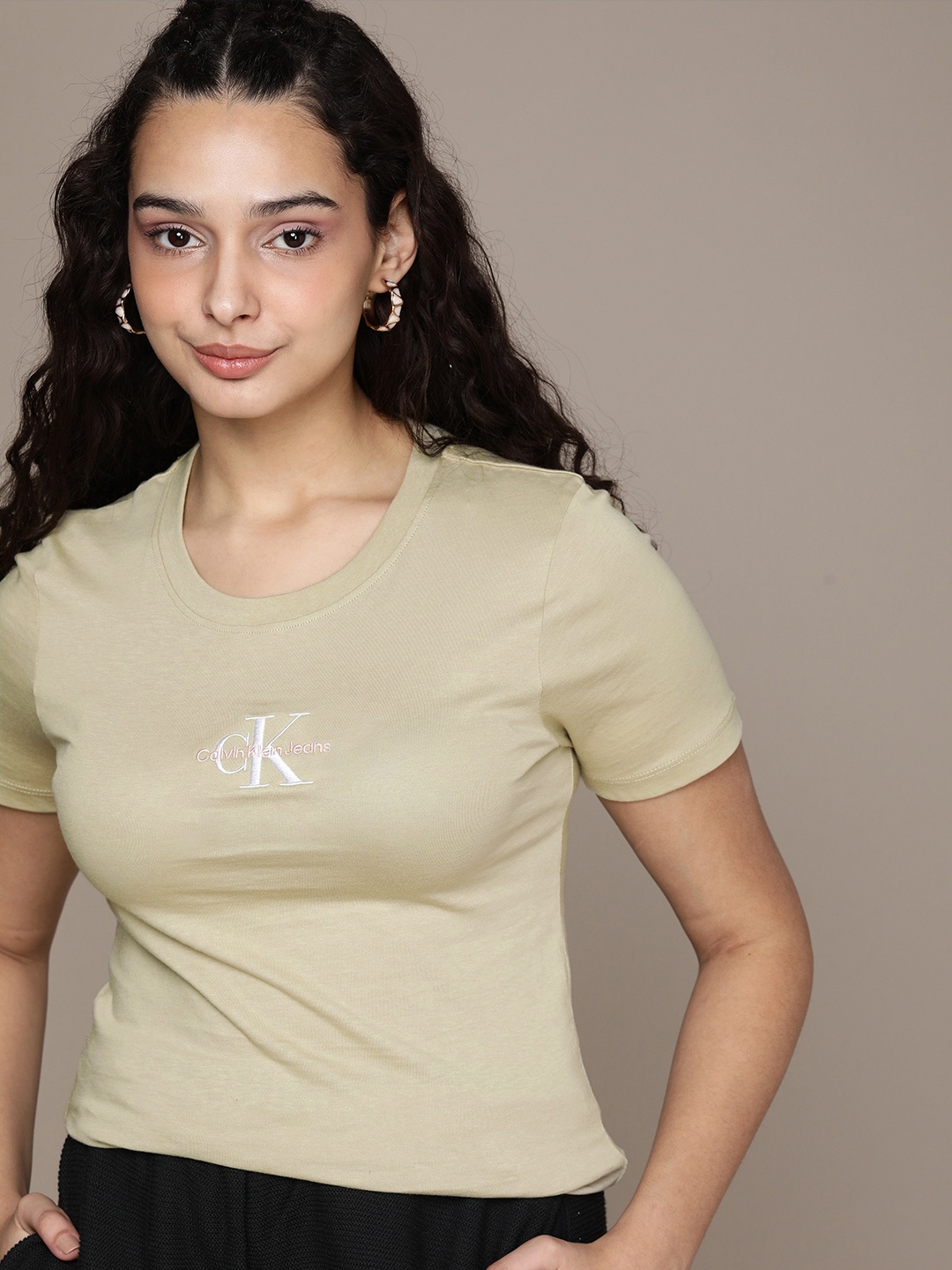 

Calvin Klein Jeans Women Beige Pure Cotton Slim Fit T-shirt