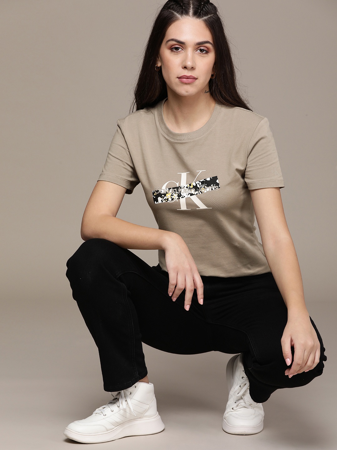 

Calvin Klein Jeans Women Nude-Coloured Brand Logo Printed Applique Slim Fit T-shirt