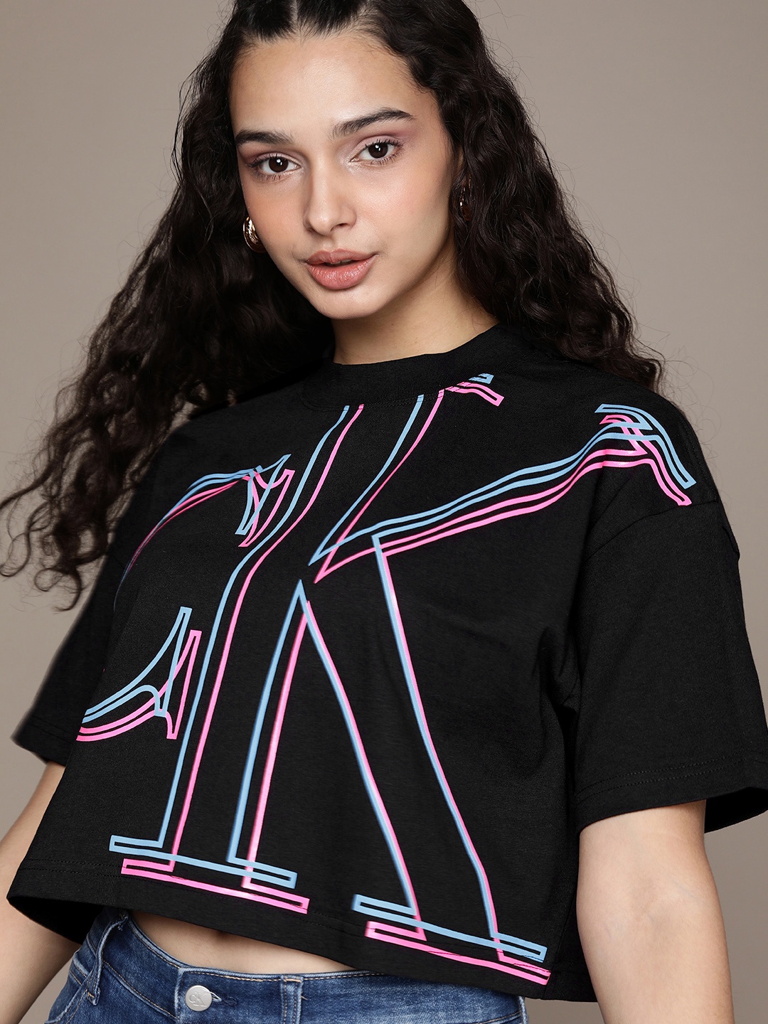 

Calvin Klein Jeans Women Black Printed Drop-Shoulder Sleeves Applique Crop T-shirt