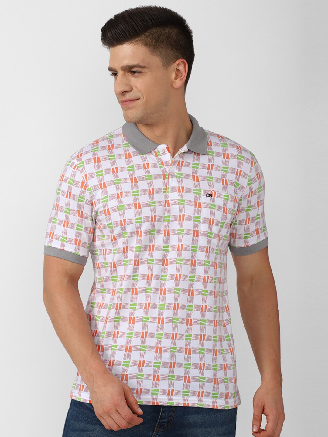 

Peter England Casuals Men White & Orange Printed Polo Collar T-shirt