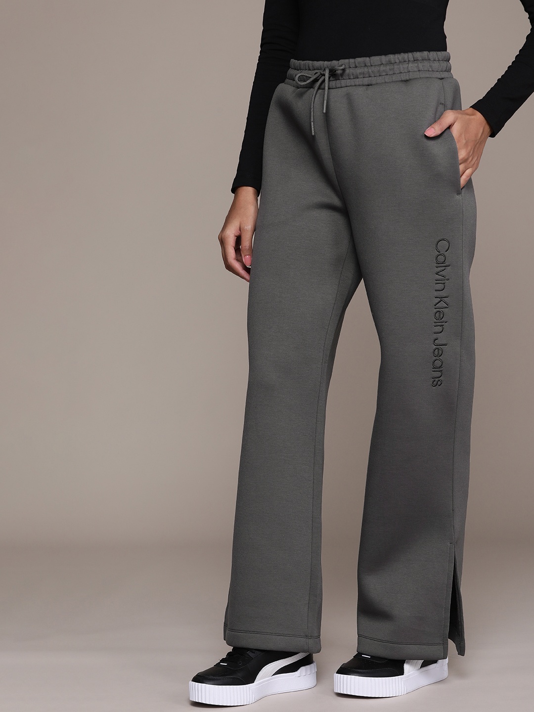 

Calvin Klein Jeans Women Off White Relaxed Fit Solid Track Pants, Charcoal