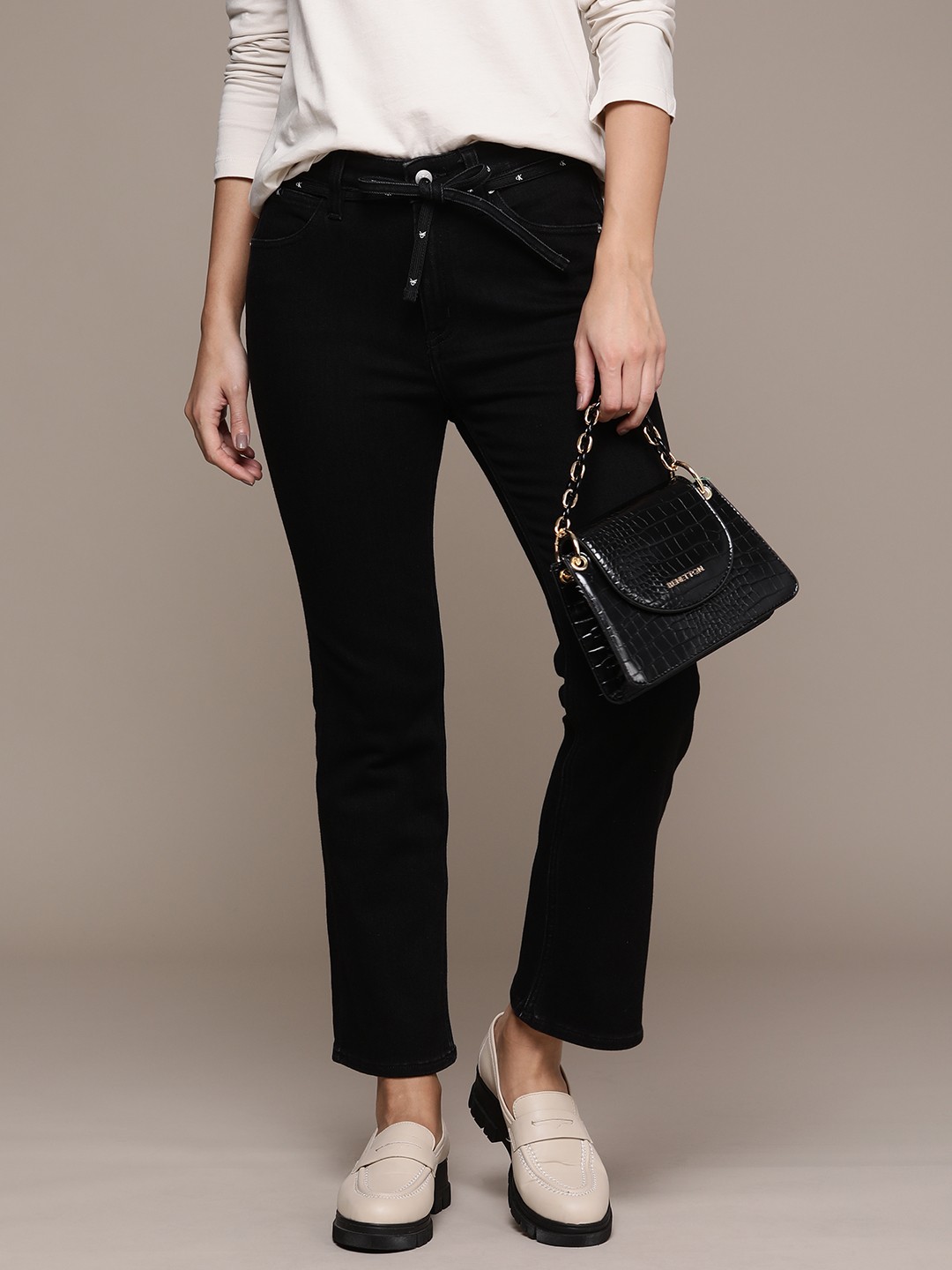 

Calvin Klein Jeans Women Slim Fit High-Rise Body Boot Ankle Stretchable Jeans, Black