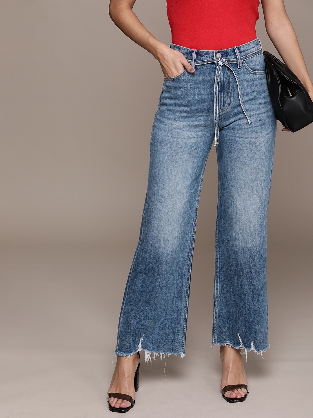 

Calvin Klein Jeans Women High Rise Wide Leg Ankle Frayed Hem Heavy Fade Stretchable Jeans, Blue