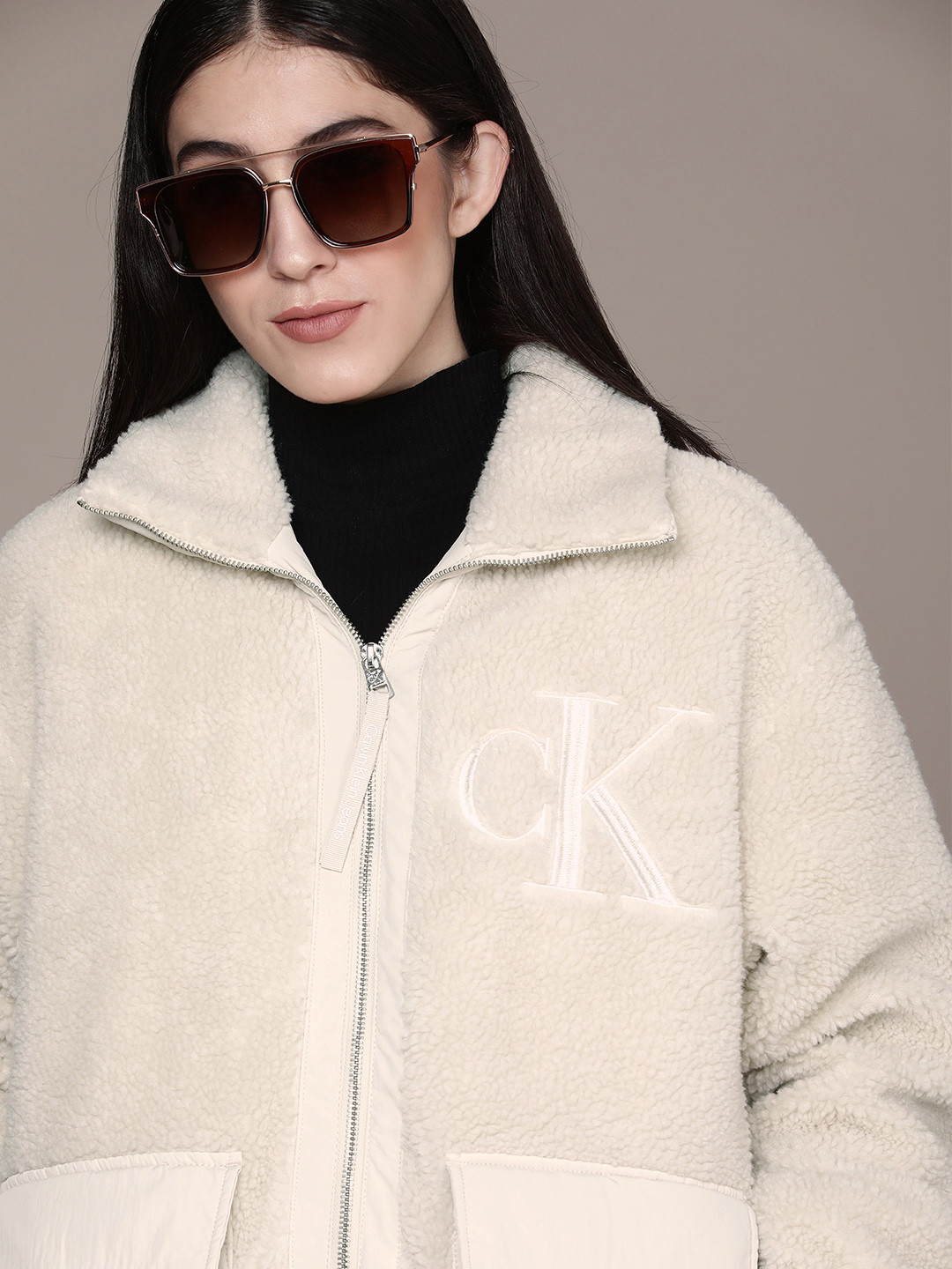 

Calvin Klein Jeans Women Beige Brand Logo Reversible Sherpa Padded Jacket