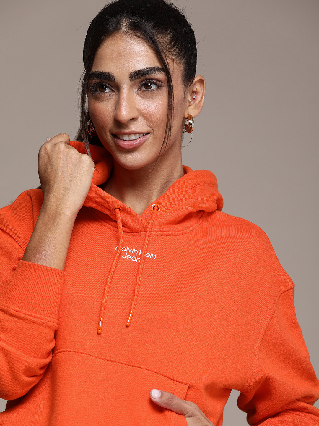 

Calvin Klein Jeans Women Orange Applique Hooded Sweatshirt