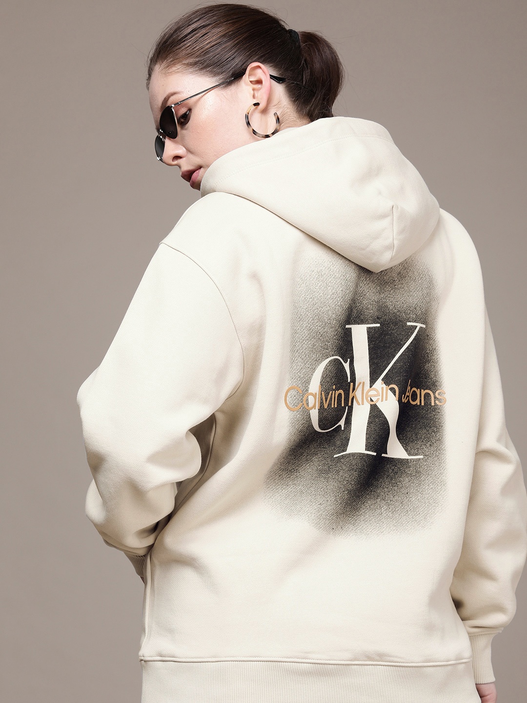 

Calvin Klein Jeans Women Beige Brand Logo Printed Applique Hooded Sweatshirt