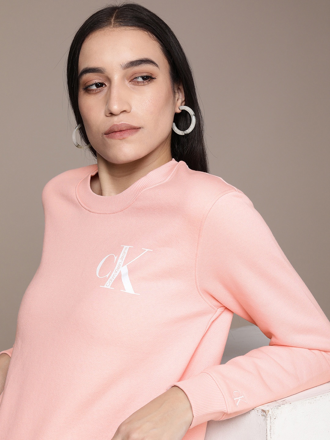 

Calvin Klein Jeans Women Peach-Coloured Brand Logo Printed Sweatshirt