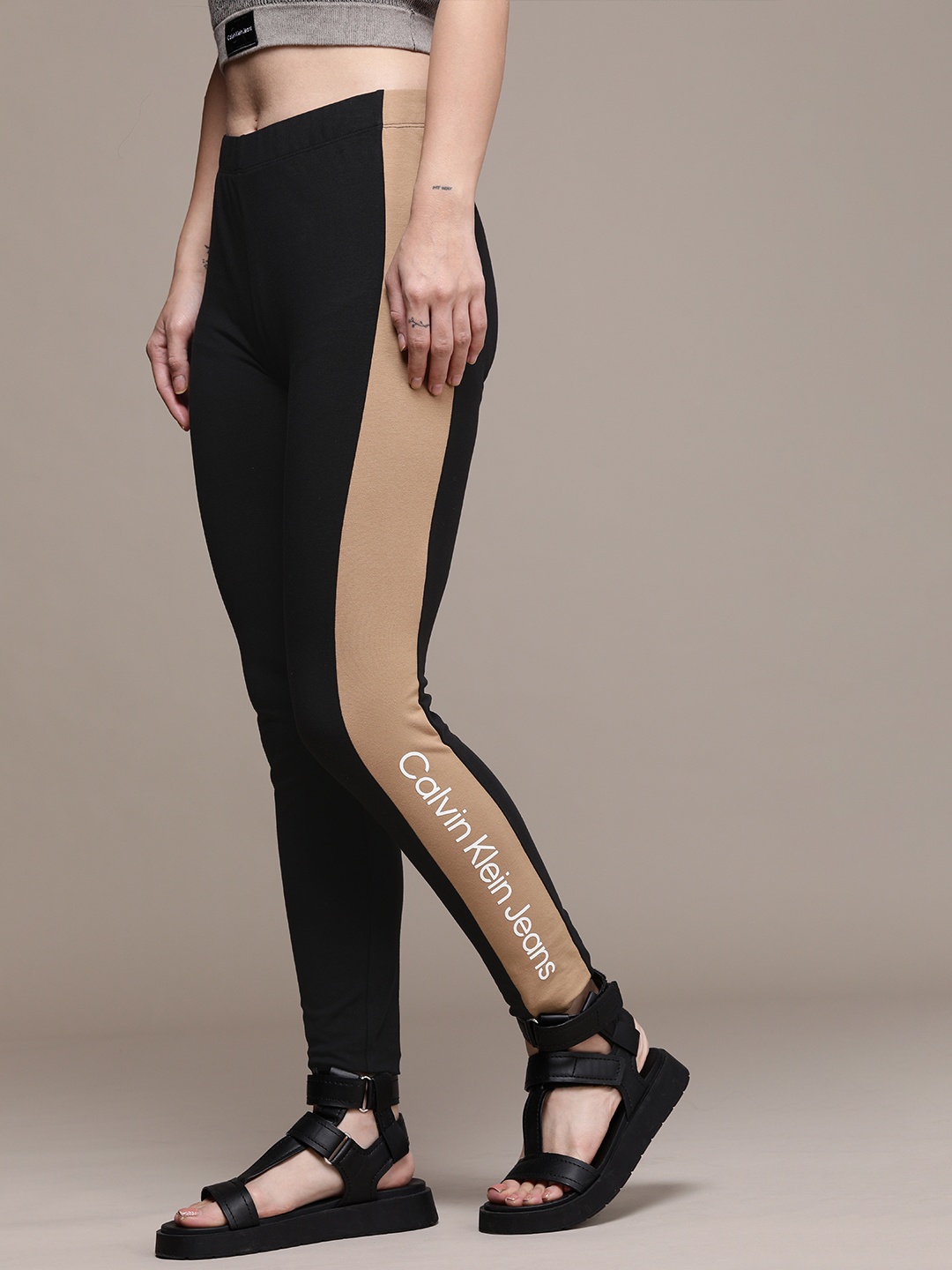 

Calvin Klein Jeans Women Black Colourblocked Leggings With Contrast Printed Side Panels