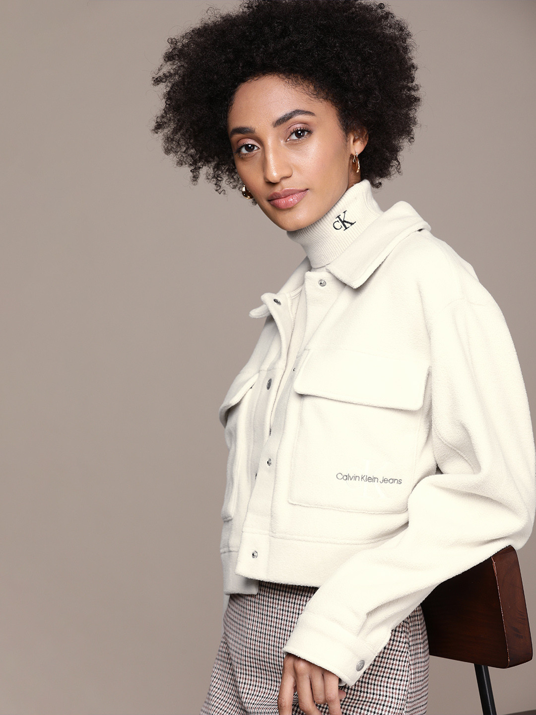

Calvin Klein Jeans Women Off White Crop Fleece Tailored Jacket