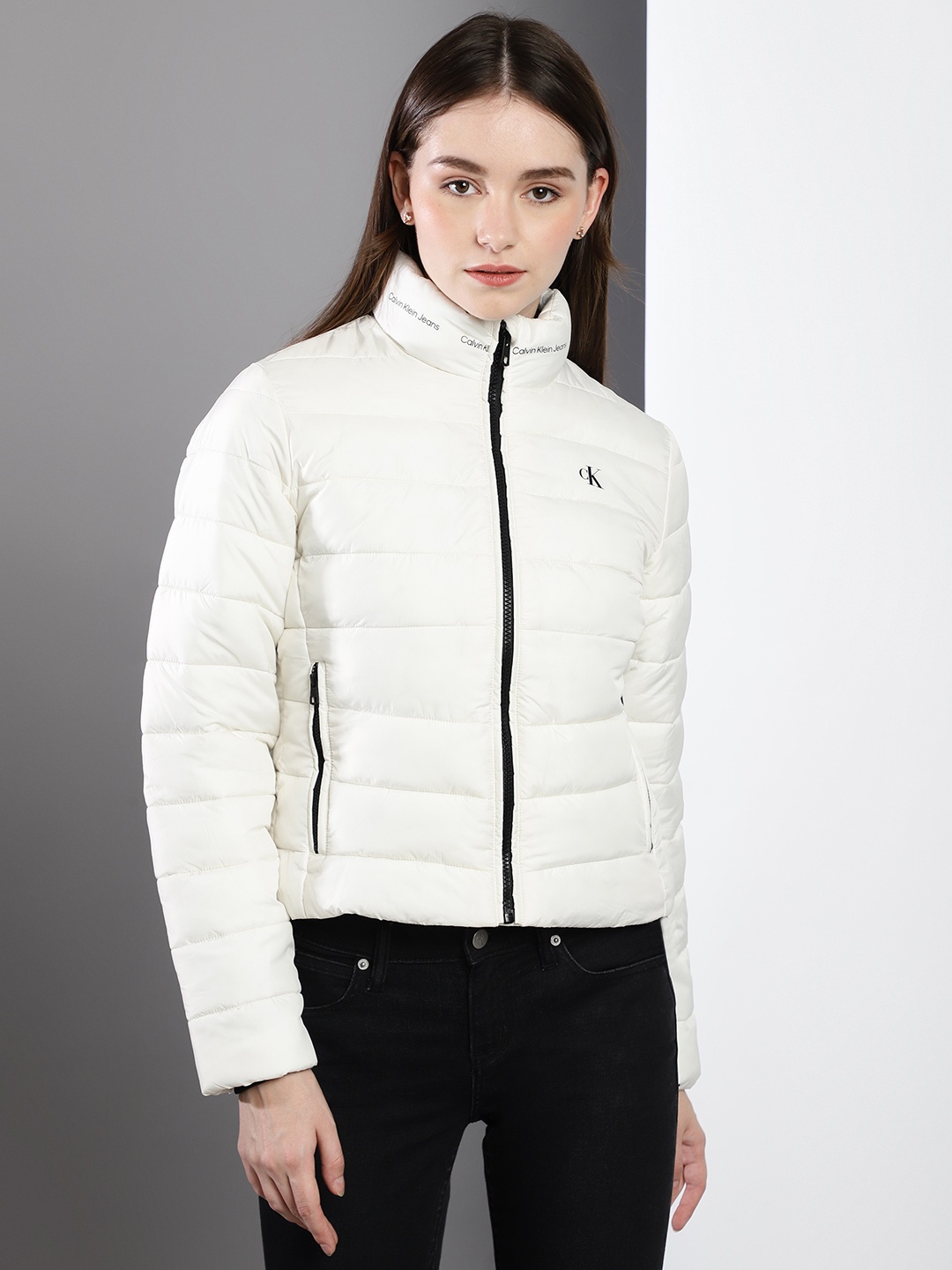 

Calvin Klein Jeans Women White Solid Mock Collar Puffer Jacket
