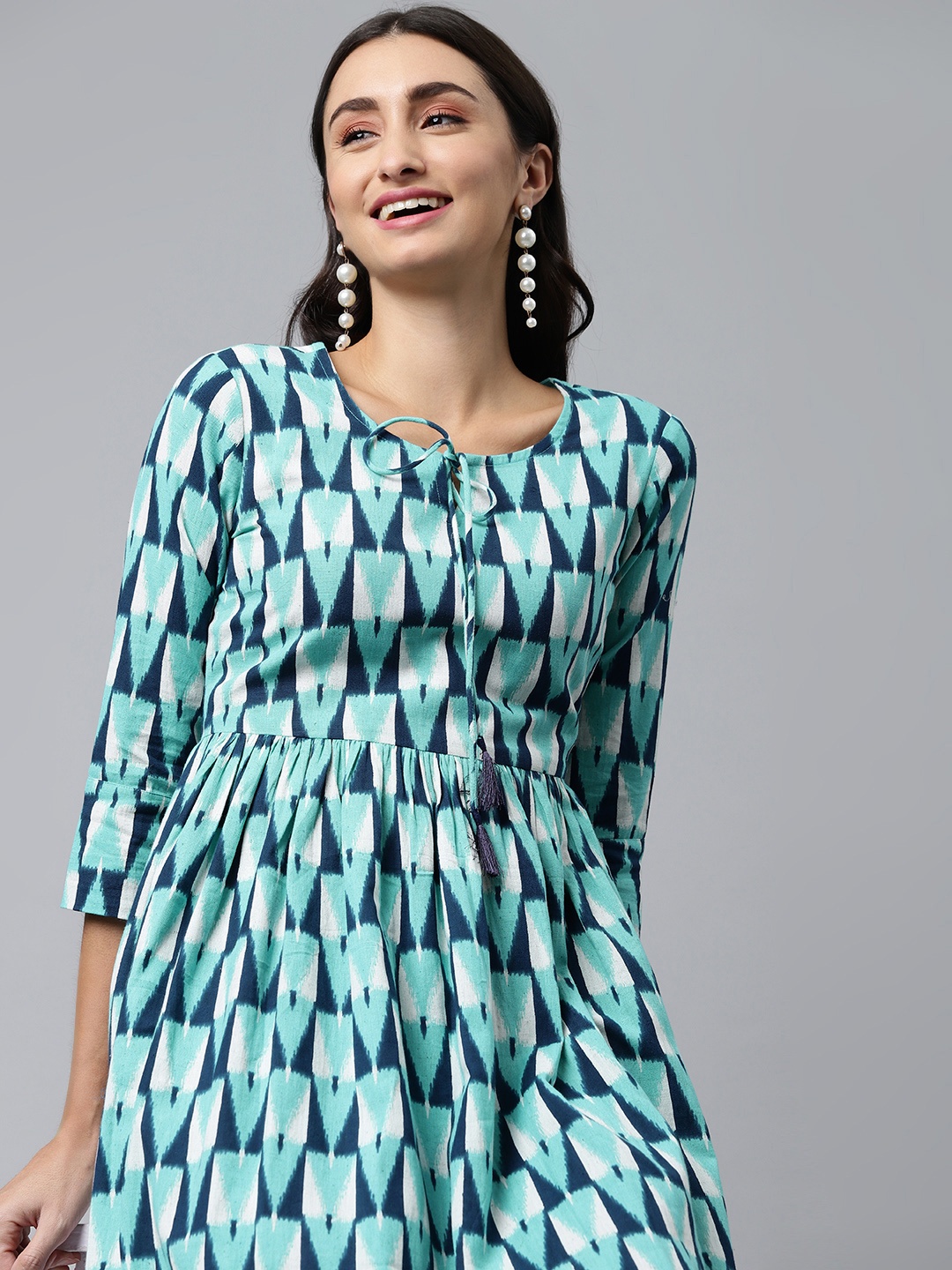 

MALHAAR Sea Green & White Geometric Printed Fit & Flared Maxi Pure Cotton Dress