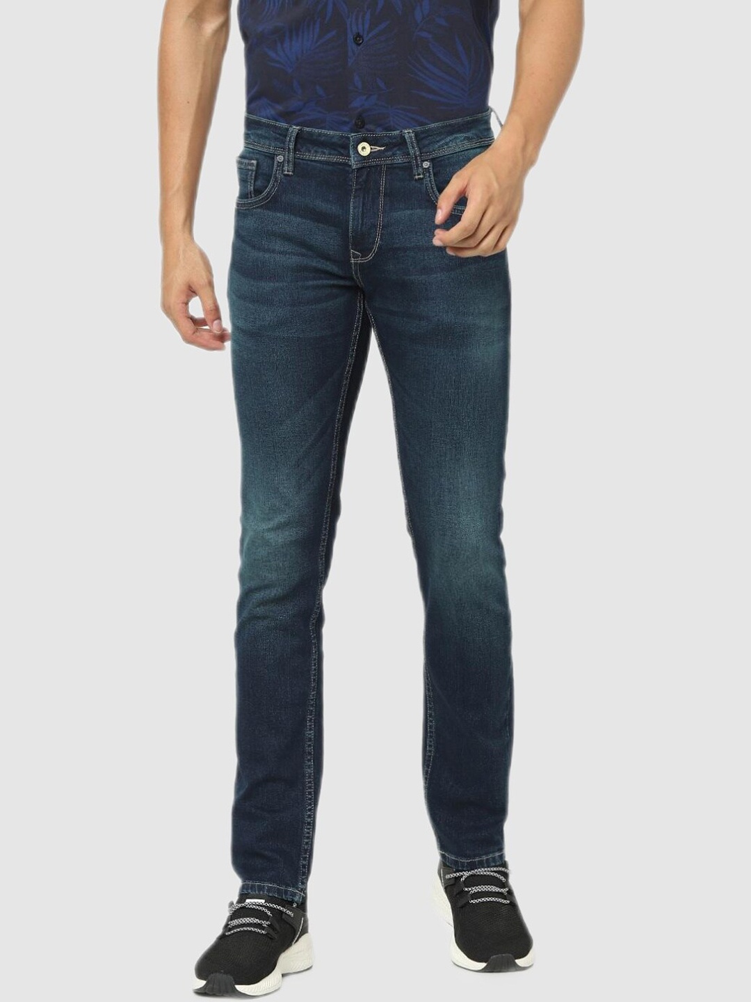 

Celio Men Navy Blue Highly Distressed Light Fade Stretchable Jeans