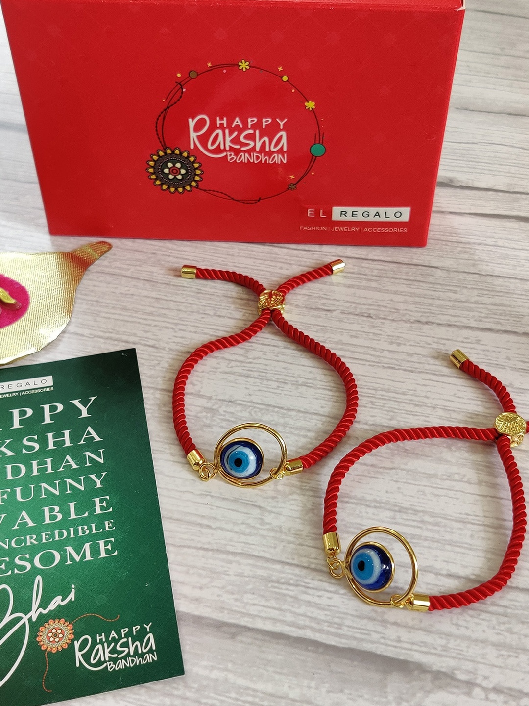 

EL REGALO Bhaiya Bhabhi Red Blue Set of 2 Rakhis with Roli Chawal Greetings Card