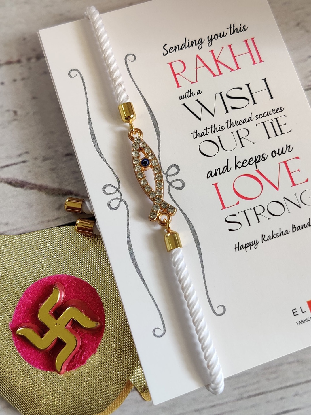

EL REGALO Gold-Toned & White CZ Studded Rakhi with Roli Chawal & Greetings Card