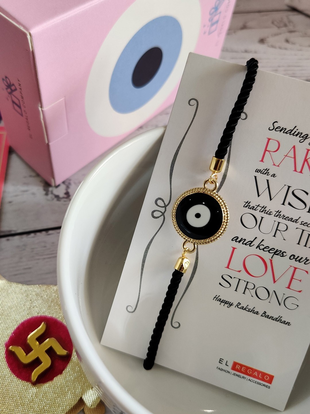 

EL REGALO Gold-Toned & Black Evil Eye Rakhi