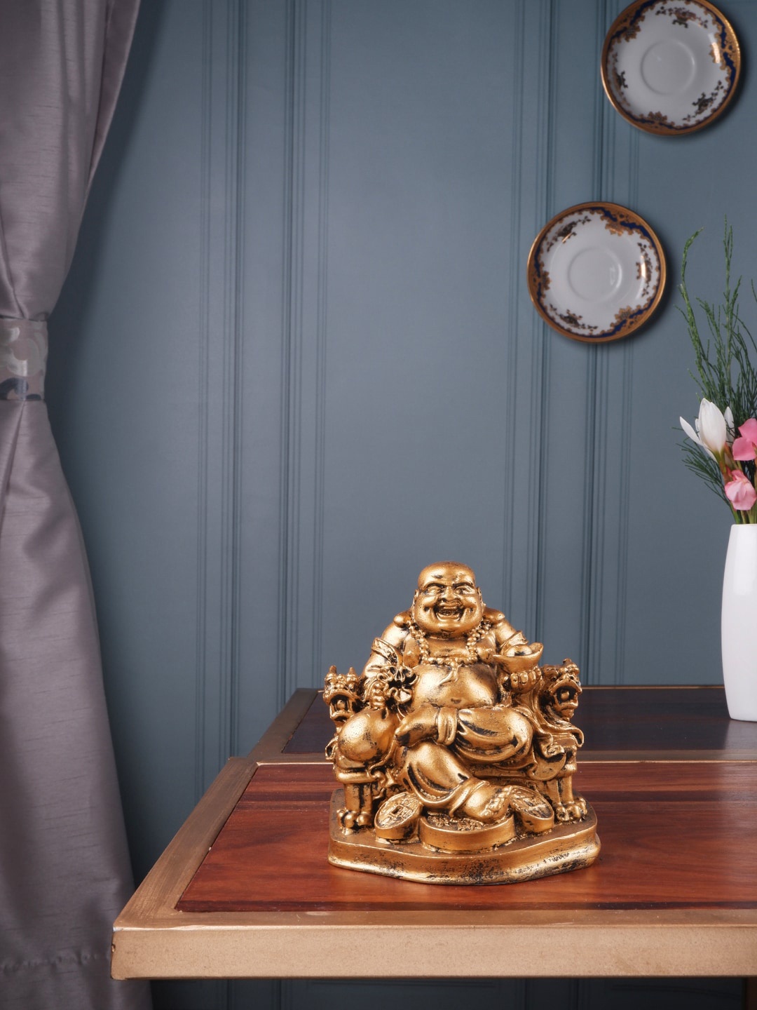 

THE WHITE INK DECOR Gold-Colored Laughing Buddha Sitting on Dragon Chair Fengshui Showpieces