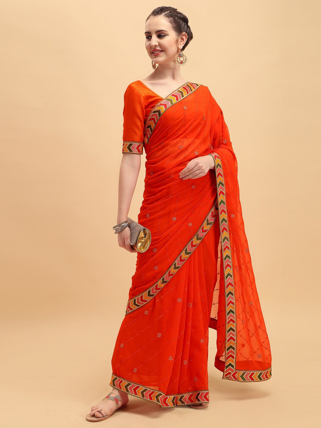 Sangria Women Orange Pure Georgette Heavy Border Celebrity Saree