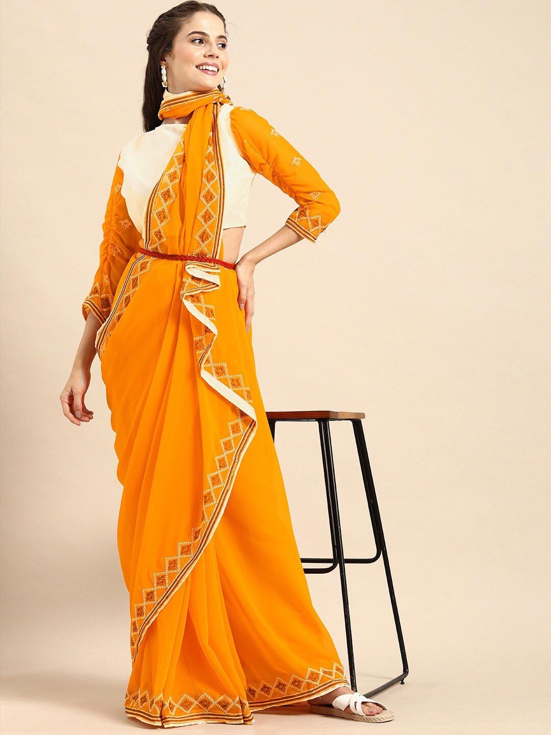 

Sangria Women Mustard Sarees