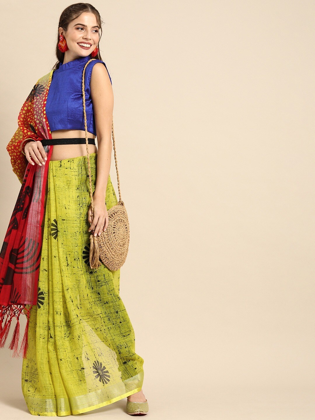 

Sangria Mustard & Red Floral Jaali Pure Linen Saree
