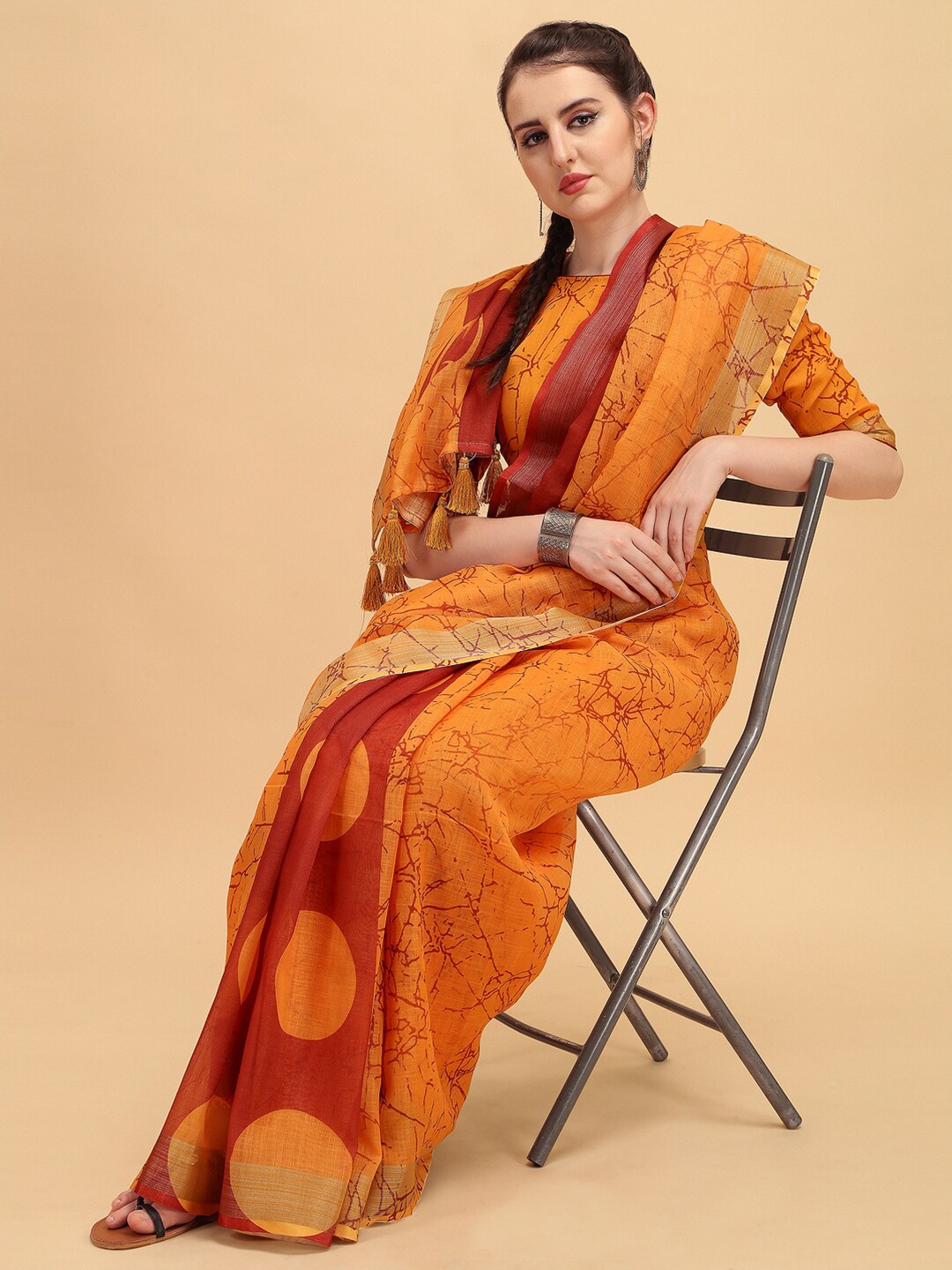 

Sangria Women Printed Mustard Sarees