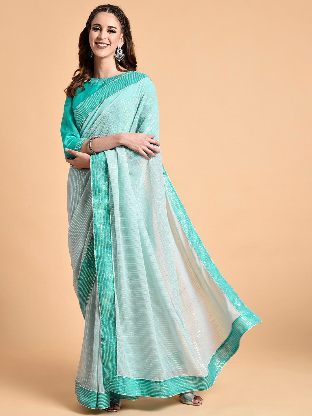 

Sangria Sea Green Embellished Sequinned Pure Georgette Saree