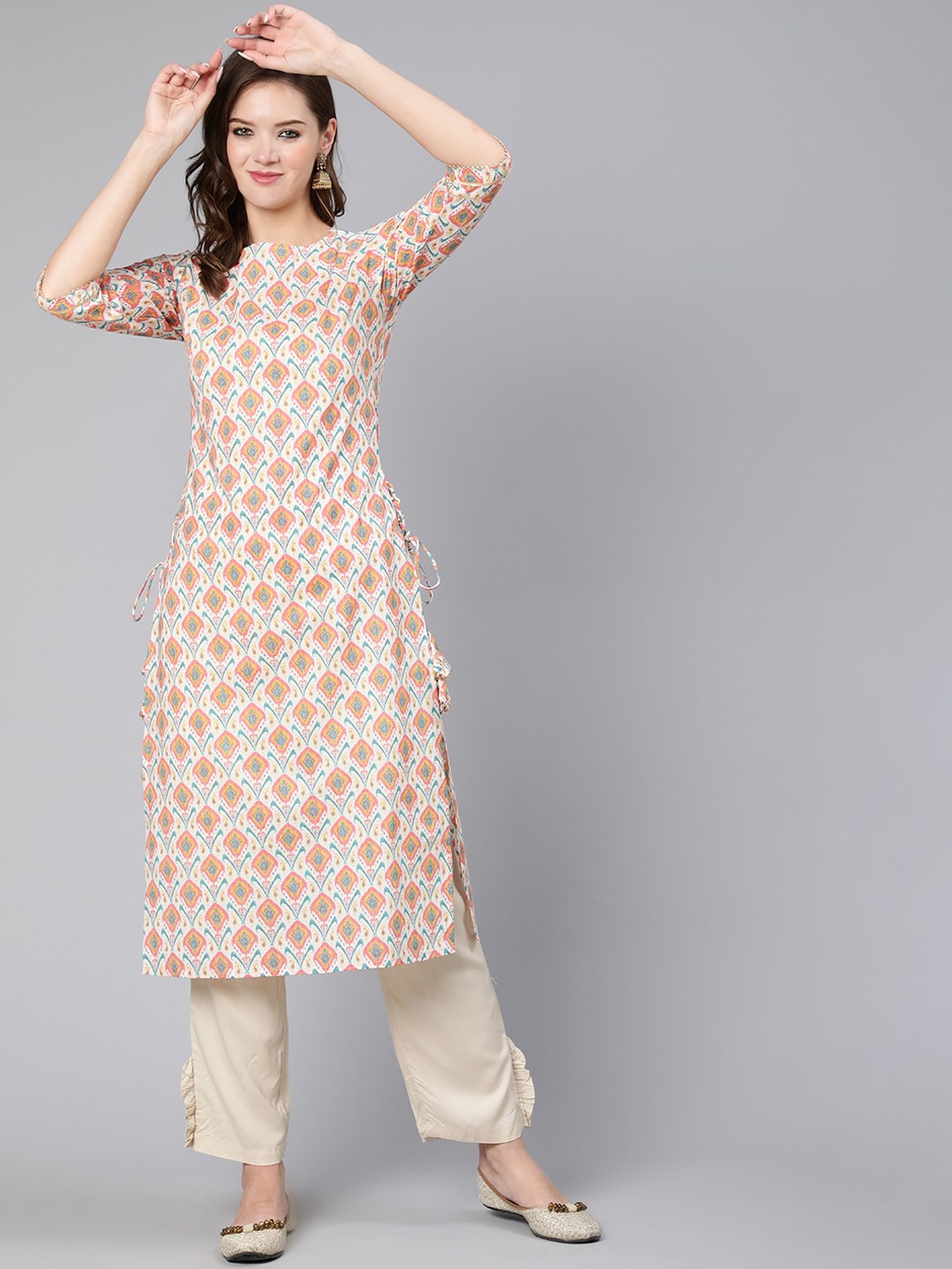 

Nayo Women Beige & Orange Ethnic Motifs Printed Kurta