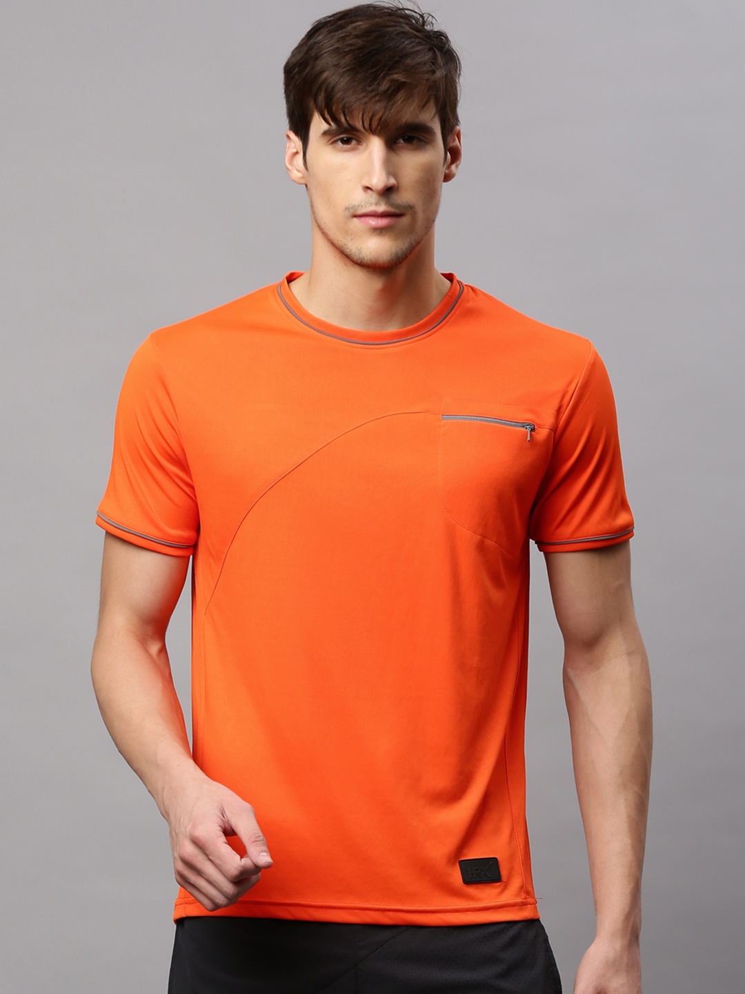 

HRX by Hrithik Roshan Men Orange Solid Round Neck T-shirt