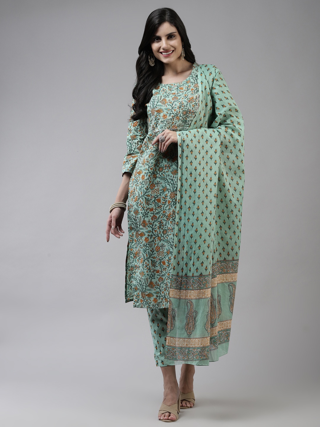 

Yufta Women Sea Green Ethnic Motifs Gotta Patti Cotton Kurta with Trousers & Dupatta
