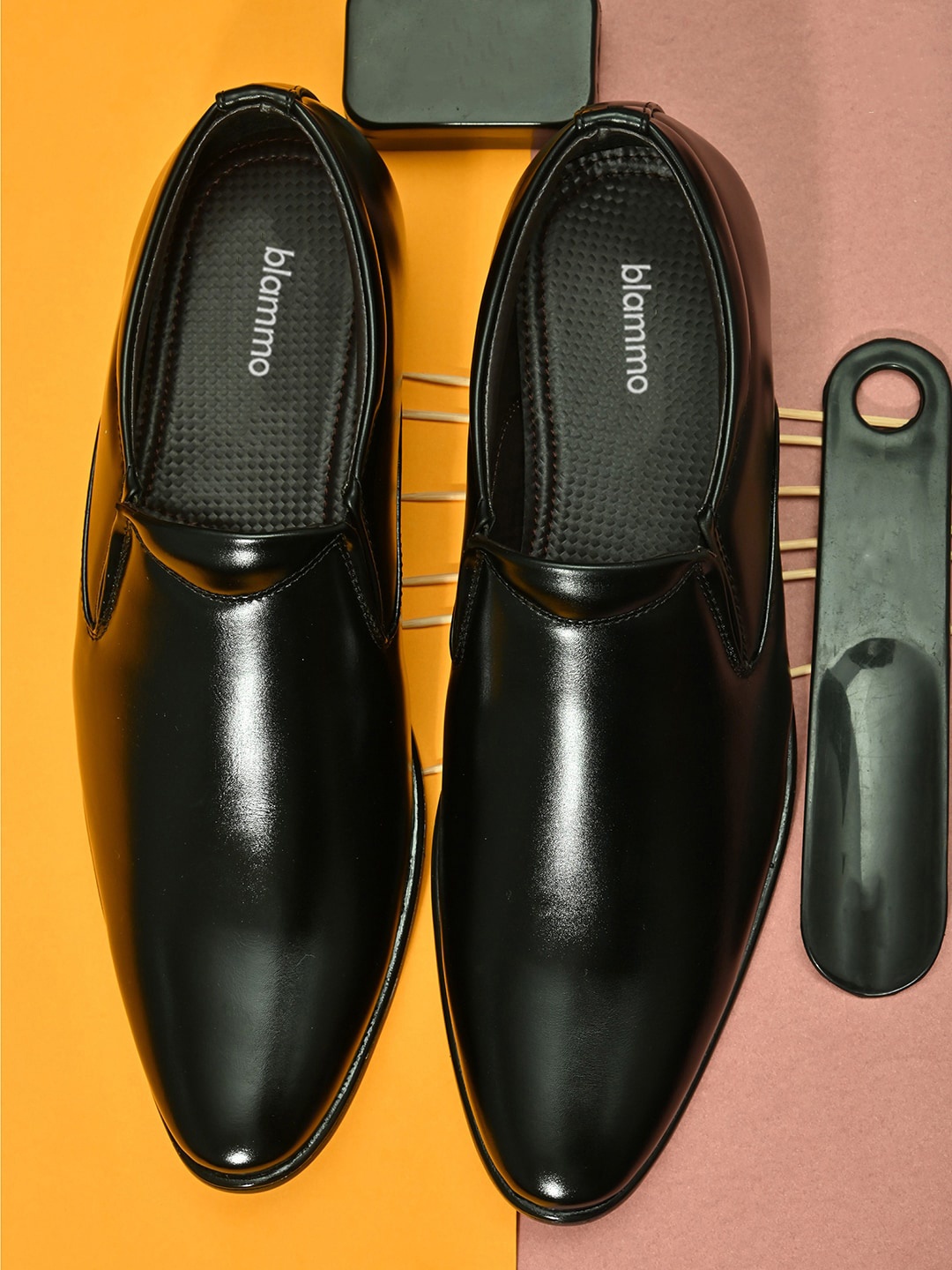 

Blammo Men Black Textured Formal Slip-On Shoes