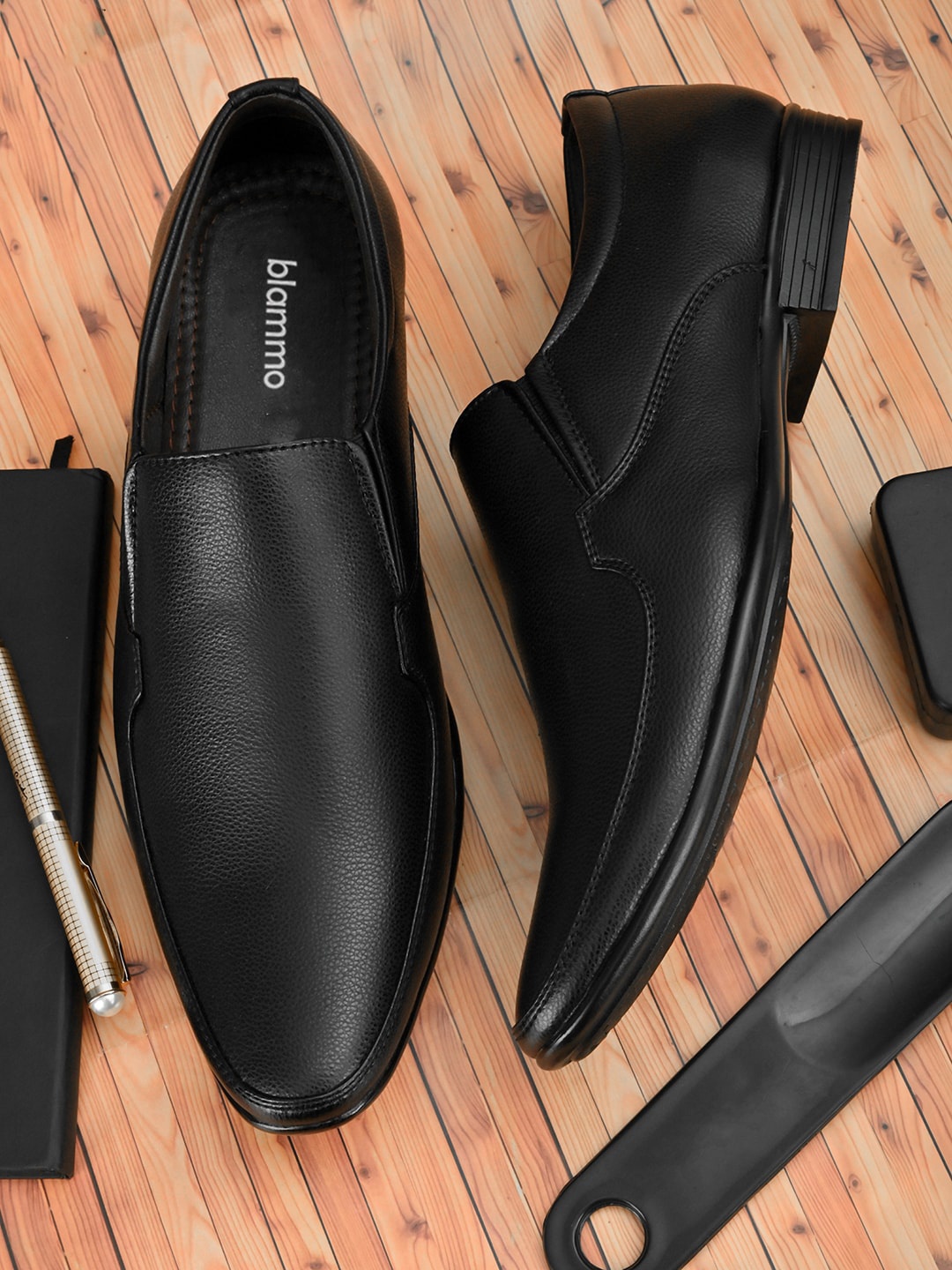 

Blammo Men Black Textured Formal Slip-On Shoes