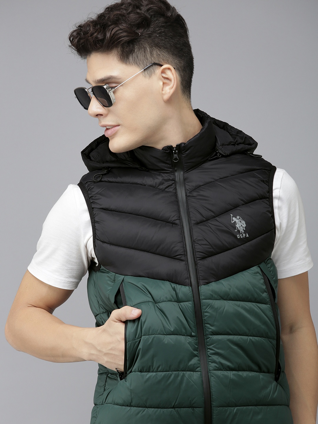 

U.S. Polo Assn. Men Black & Teal Green Colourblocked Sleeveless Puffer Jacket