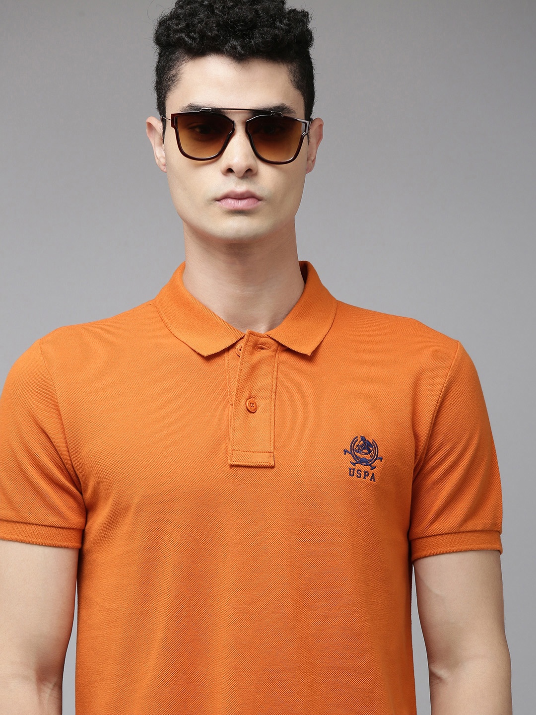 

U.S. Polo Assn. Men Orange Solid Polo Collar Pure Cotton Slim Fit T-shirt