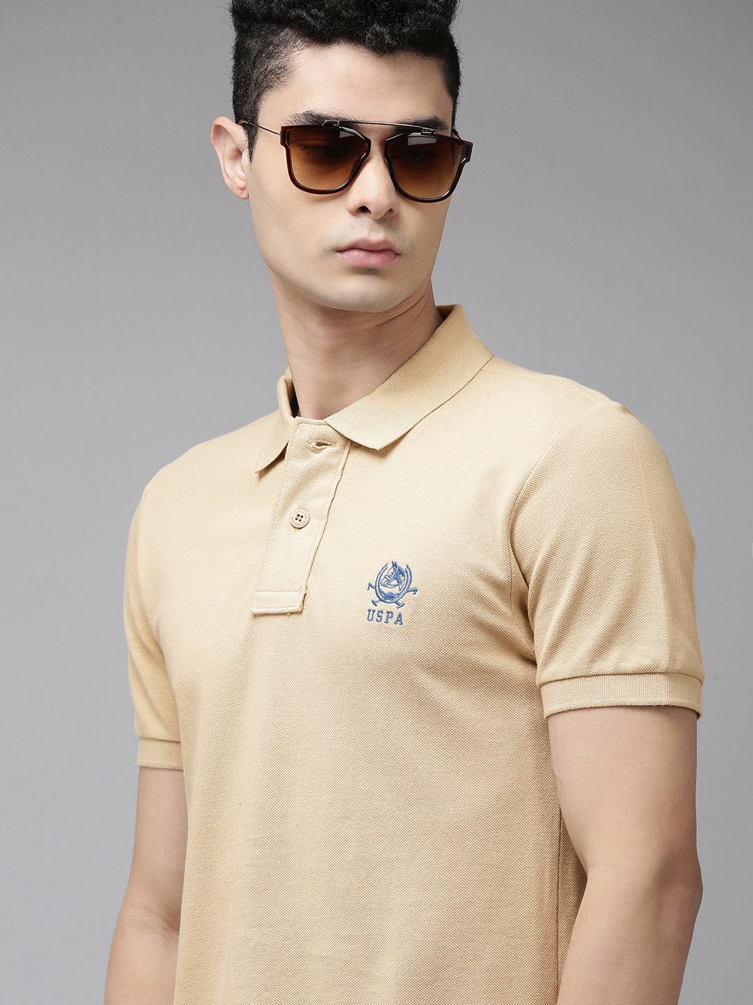 

U.S. Polo Assn. Men Beige Solid Pure Cotton Slim Fit T-shirt