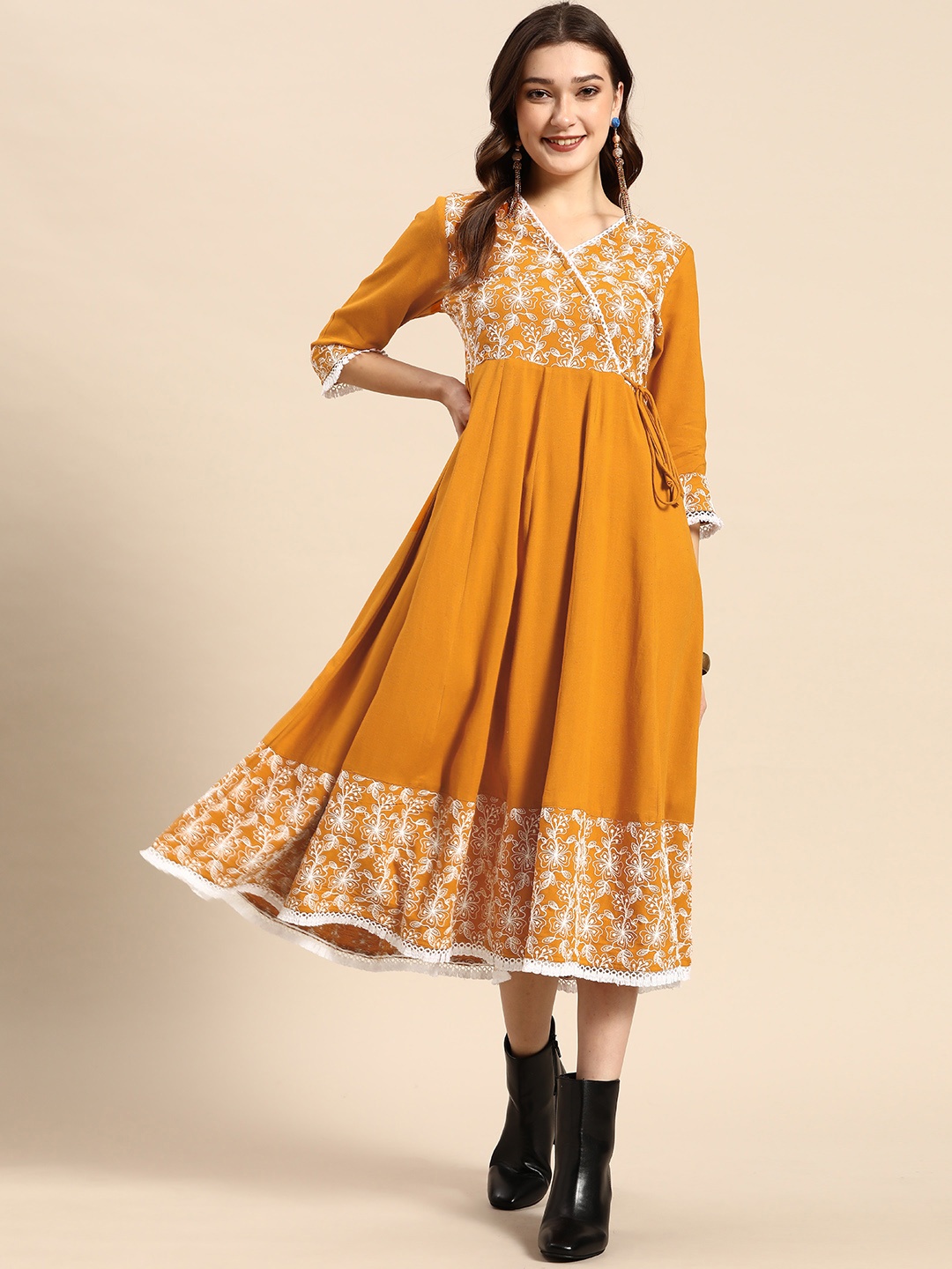 

Sangria Mustard Yellow & White Floral Embroidered Lace Inserts Fringed Midi Wrap Dress