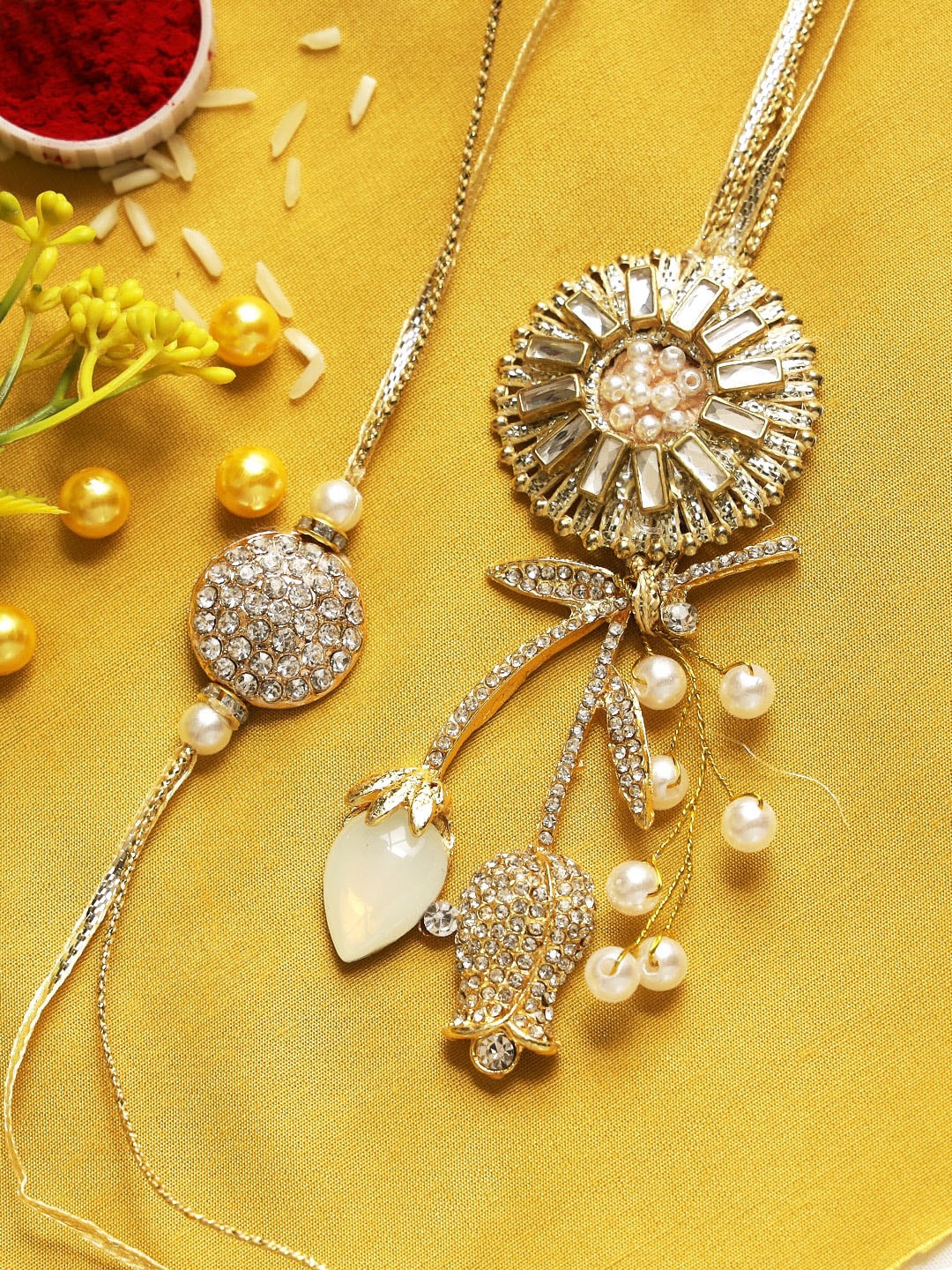 

Aapno Rajasthan Unisex Gold-Toned Set of 2 Flower Bouquet Bhaiya Bhabhi Rakhi