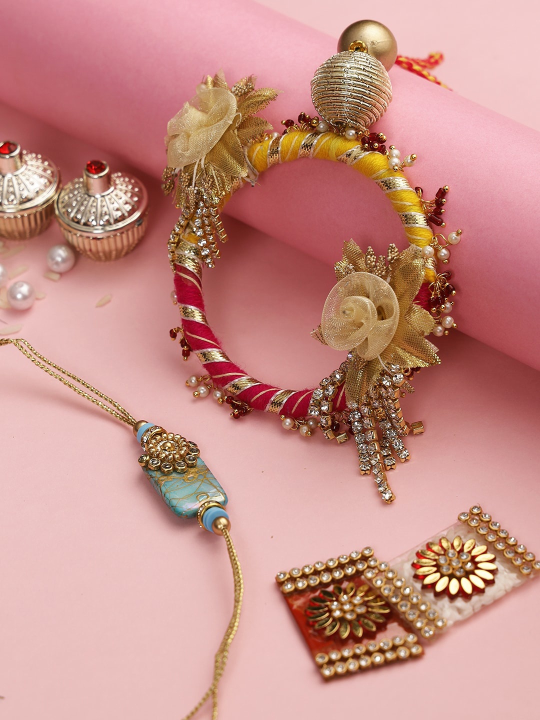

Aapno Rajasthan Gold & Blue Gotta Patti Bhaiya Bhabhi Rakhi Set