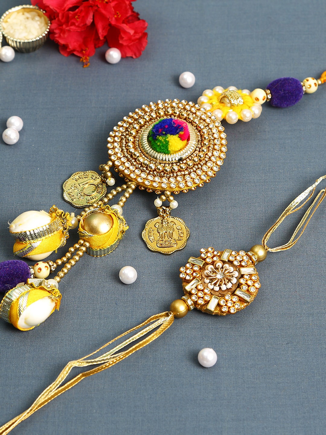 

Aapno Rajasthan Gold Tone AD Studded Bhaiya Bhabhi Rakhi Set With Box