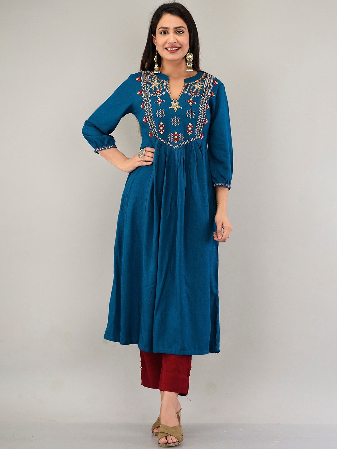 

PRAKRTEE Women Teal & Red Yoke Design Thread Work A-Line Kurta