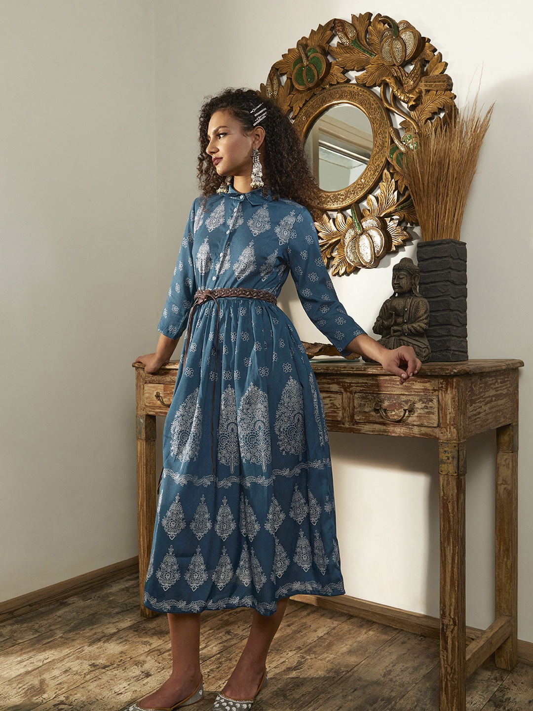 

Sangria Women Teal Blue & Golden Ethnic Motif Printed A-Line Midi Dress