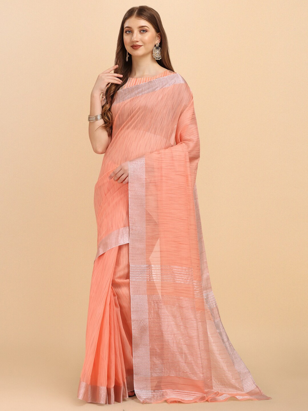 

ZIKARAA Women Peach-Coloured & Silver-Toned Zari Linen Blend Saree