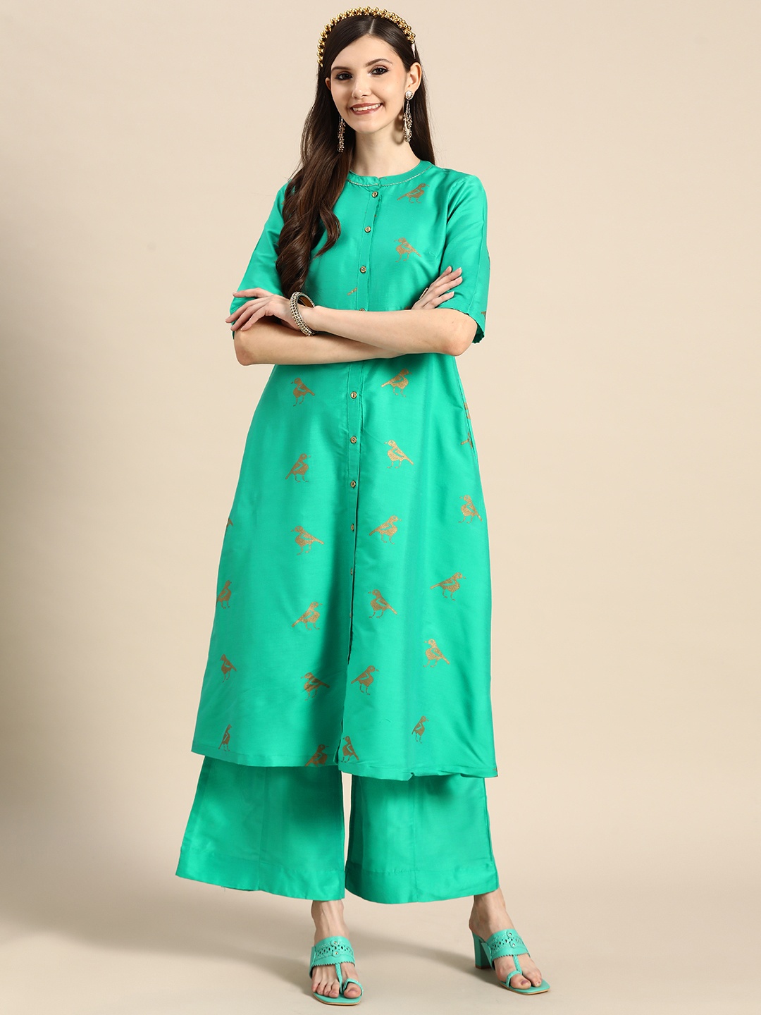 

Sangria Women Green & Golden Ethnic Motifs Printed Kurta with Palazzos